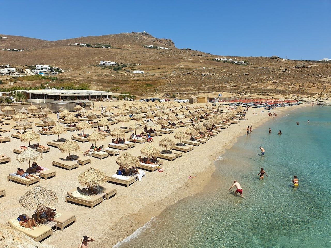 The clear turquoise water and sheltered cove of Lia Beach in the far southeast of Mykonos