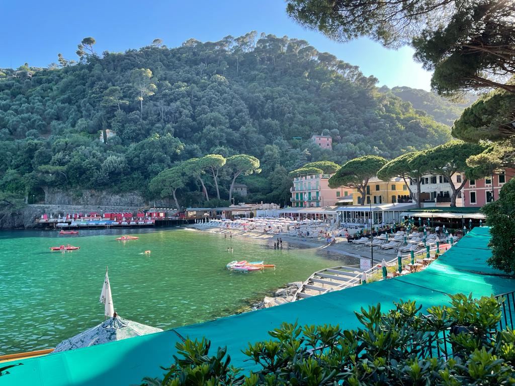 The small pale sand cove of Paraggi with clear green water near Portofino in Liguria
