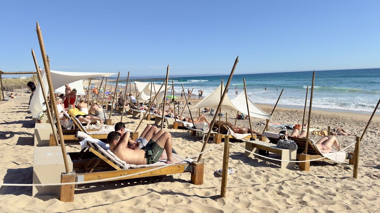 The long open Atlantic sand of Costa da Caparica south of Lisbon
