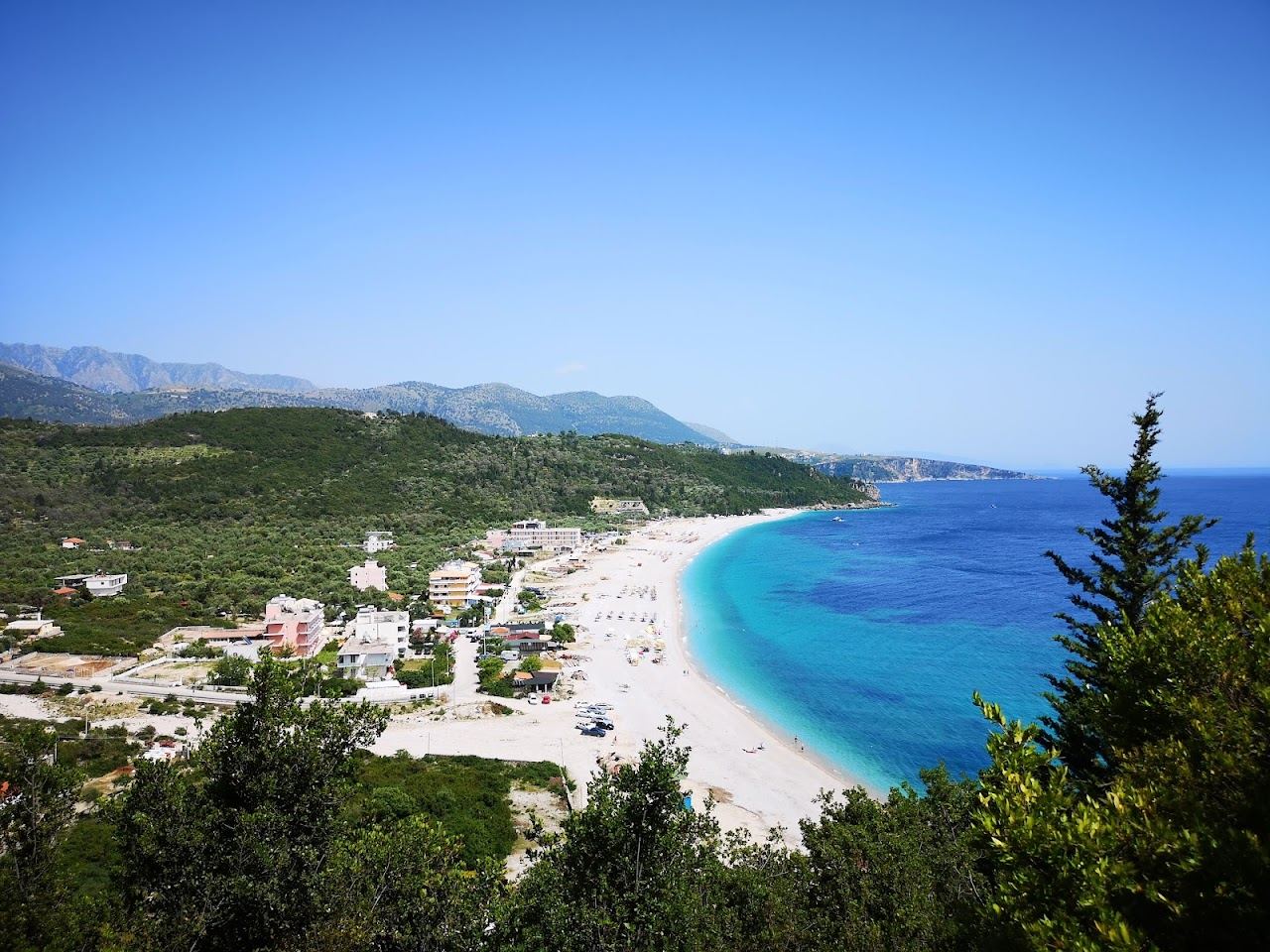 The shoreline and clear water at Livadhi near Himare on the Albanian Riviera