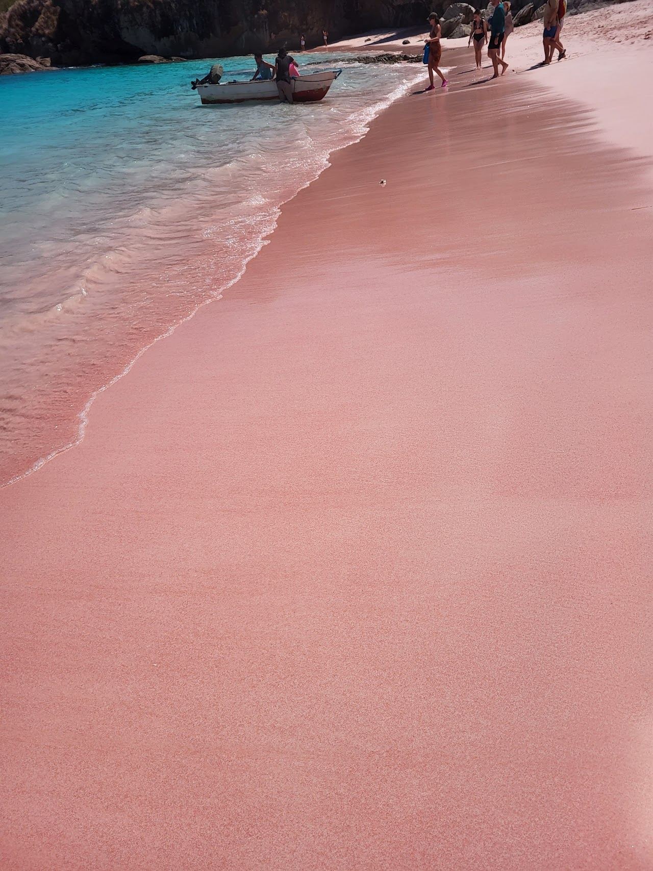 The long pink tinted sand of Long Beach on Padar Island near Labuan Bajo