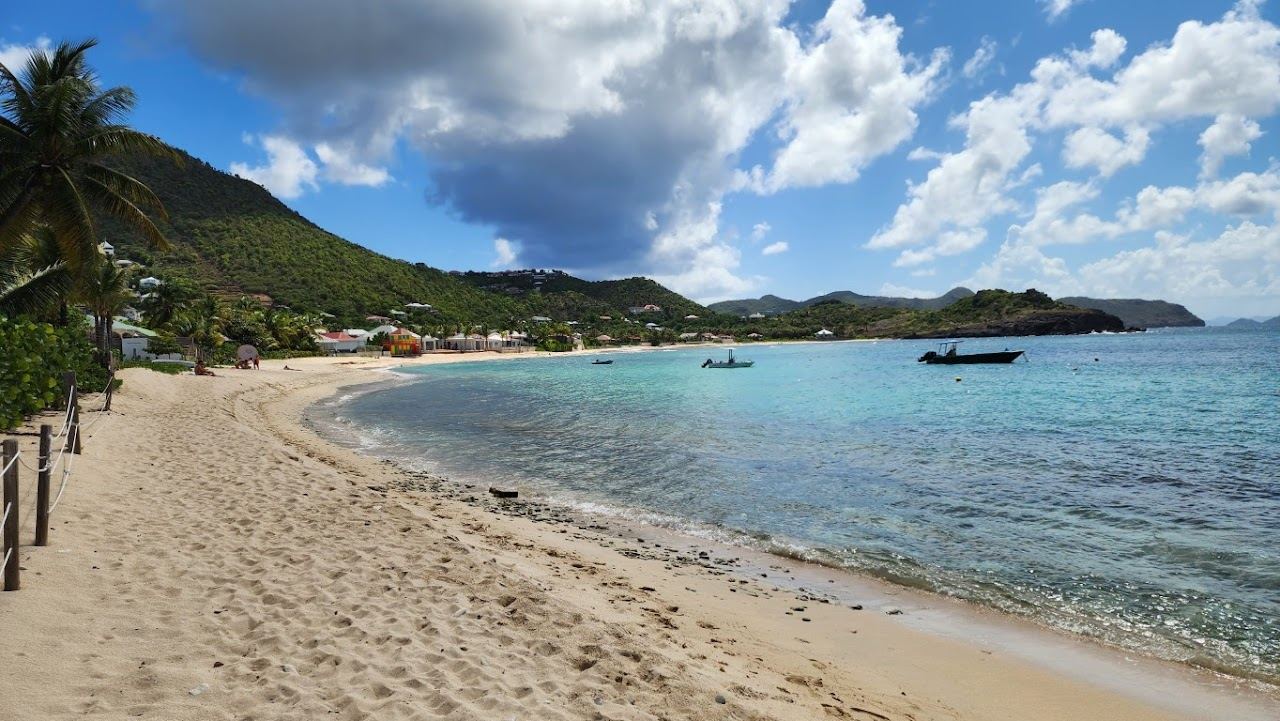 The reef sheltered turquoise water and pale sand of Lorient Beach on the north coast of St Barths