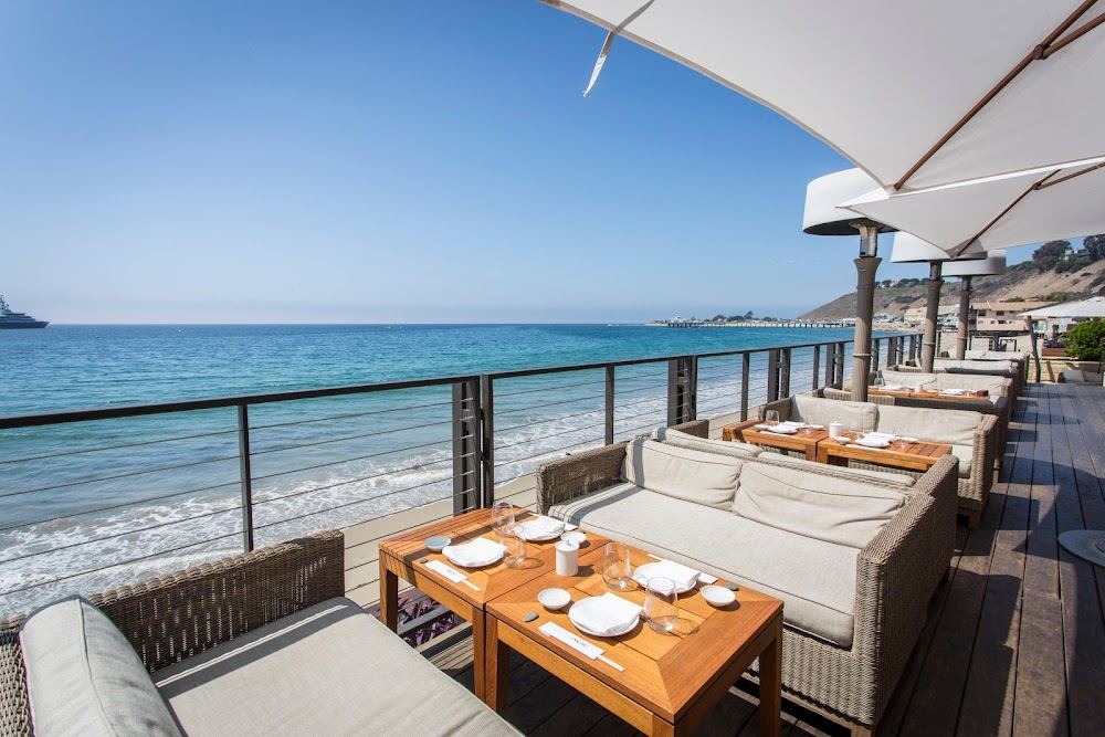 Oceanfront deck and dining at Nobu Malibu above Carbon Beach