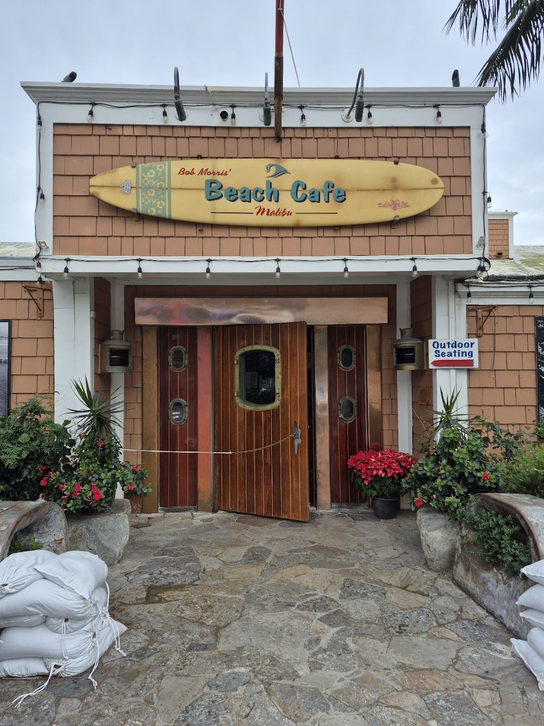The beach cafe and tables on the sand at Paradise Cove in Malibu