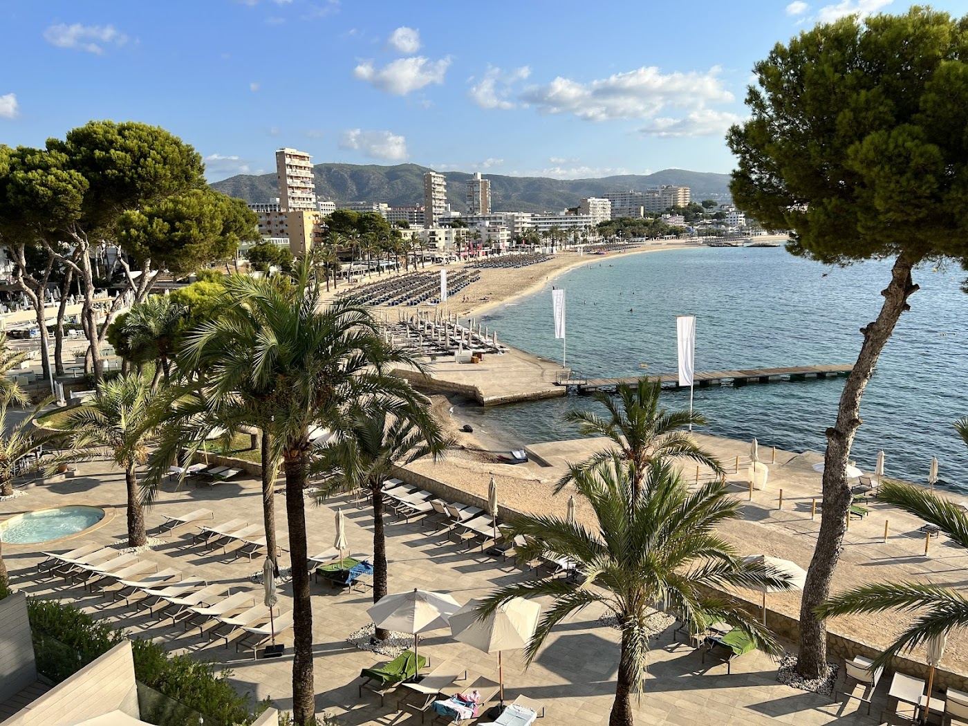 Wide golden sand and blue sea at the resort beach of Magaluf in Mallorca