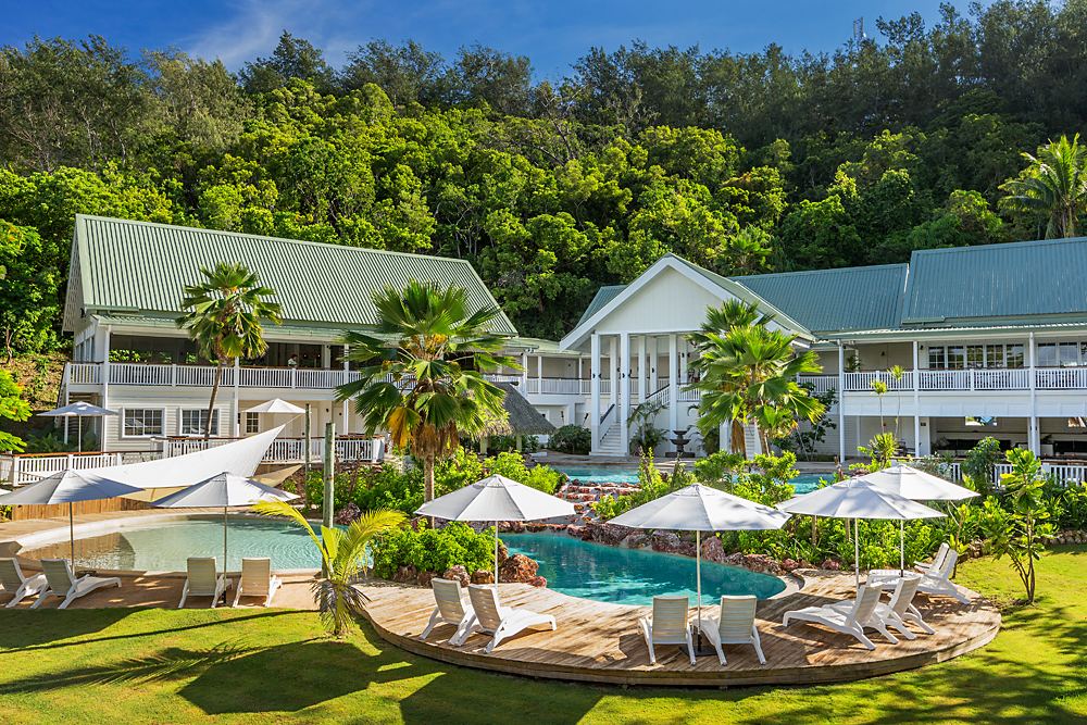 Pale sand and palms at a beach resort on Malolo Island in the Mamanucas of Fiji