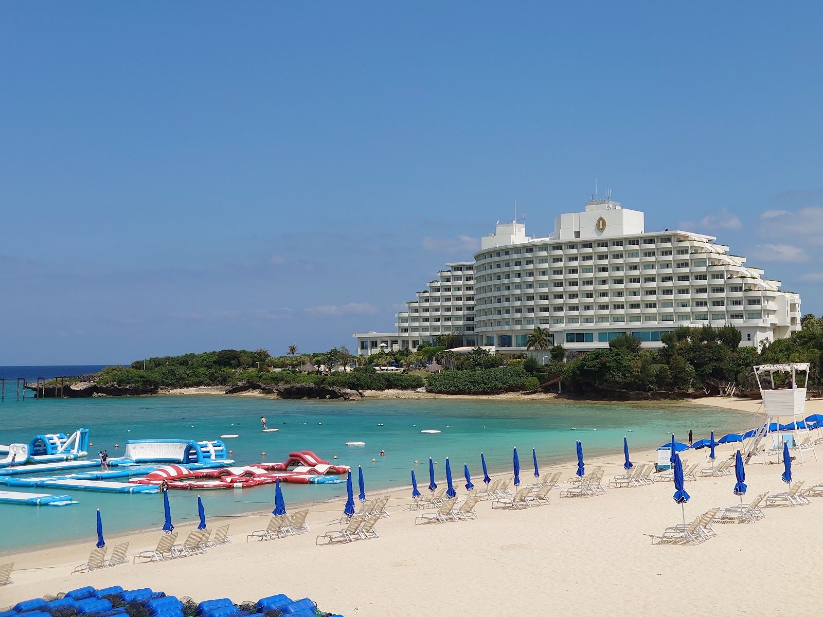 The calm sheltered resort bay of Manza Beach beneath Cape Manzamo in Onna Okinawa