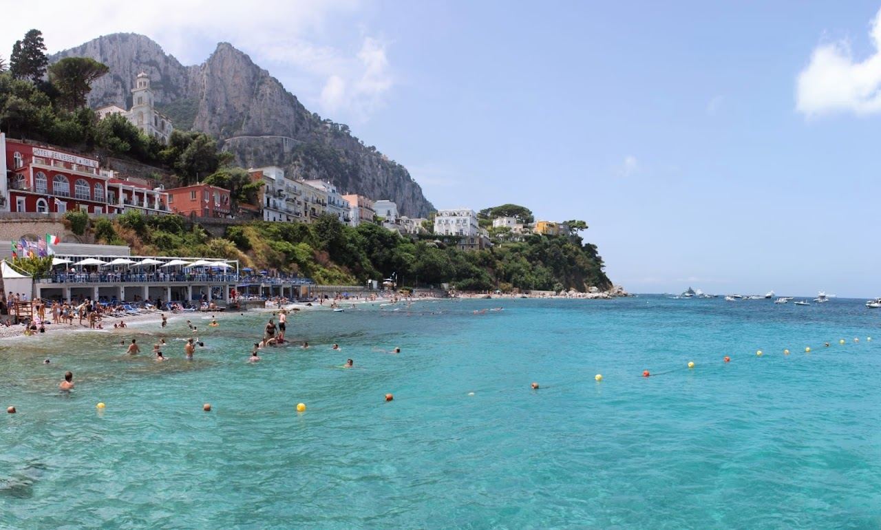 The long pebble beach of Marina Grande beside the ferry port in Capri