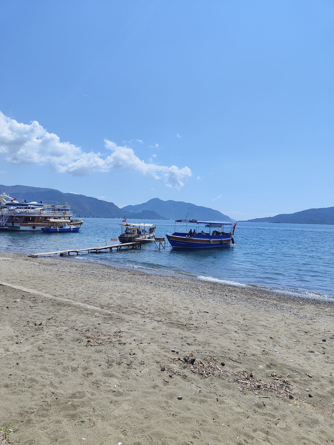 The long seafront and bay at Marmaris on the Turkish coast, lined with hotels and beach bars