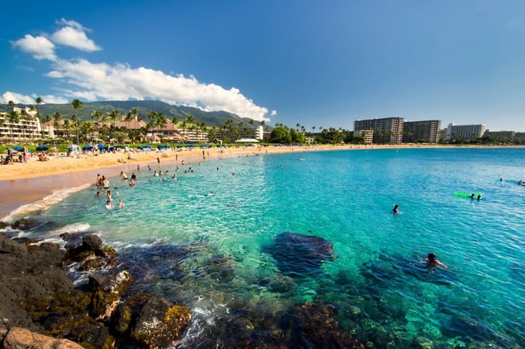 Golden sand and calm blue water along Kaanapali Beach on the west coast of Maui Hawaii