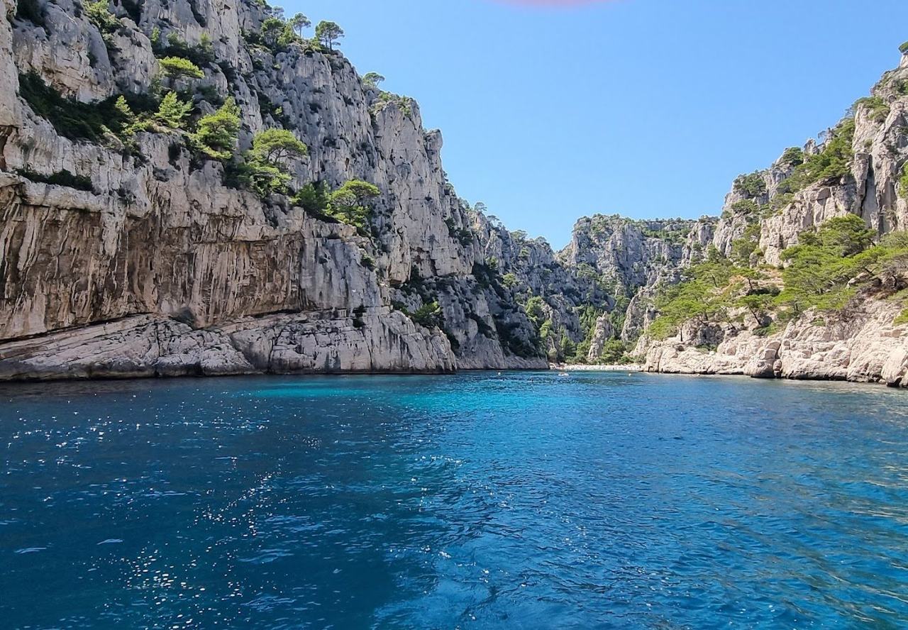 White limestone cliffs above the narrow clear inlet of Calanque d'En-Vau near Cassis