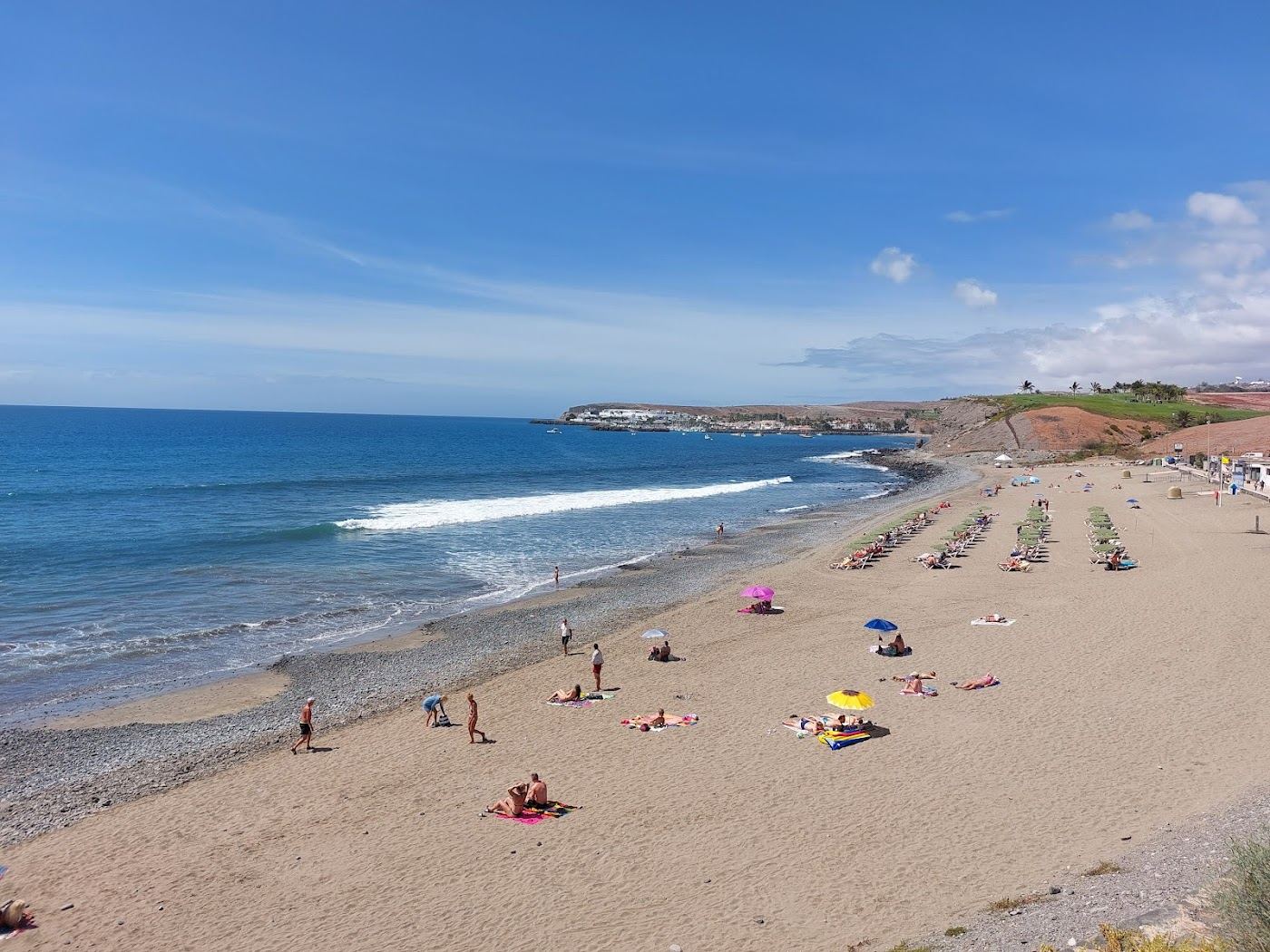 Golden beach and seafront promenade at Meloneras near the Maspalomas dunes in Gran Canaria
