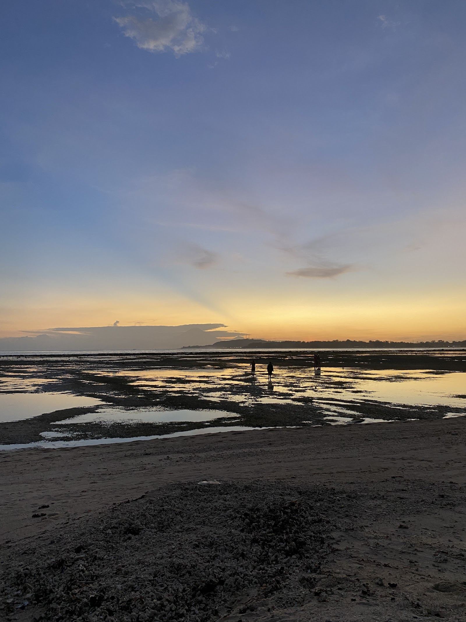 Quiet west facing sand at sunset on Gili Meno