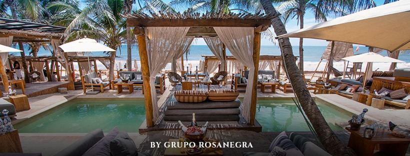 Cabanas and white sand at a Tulum beach club