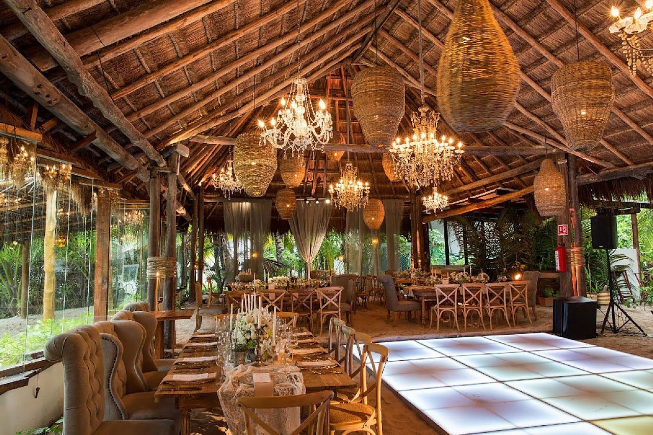 Relaxed sunbeds on the white sand at Ziggy's beach in Tulum