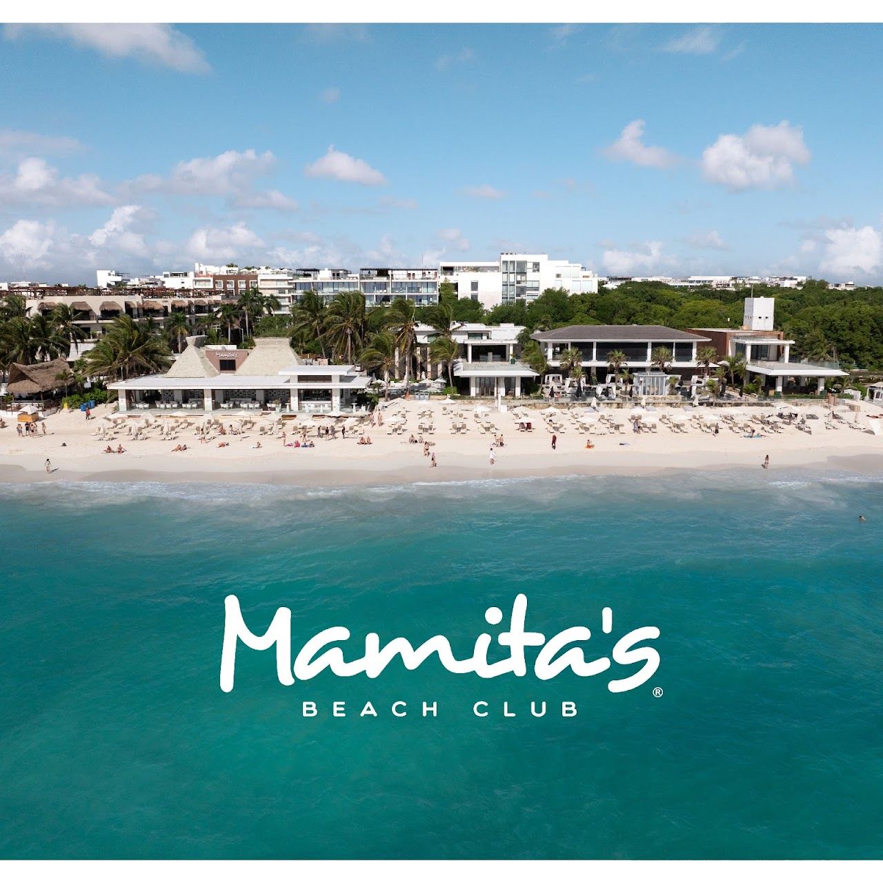 Daybeds and pool at Mamitas beach club in Playa del Carmen