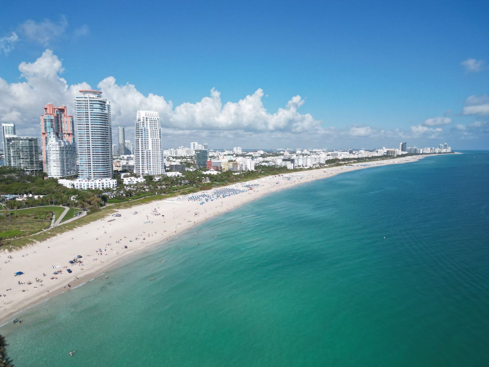 Pastel lifeguard tower and free public sand at South Beach in Miami