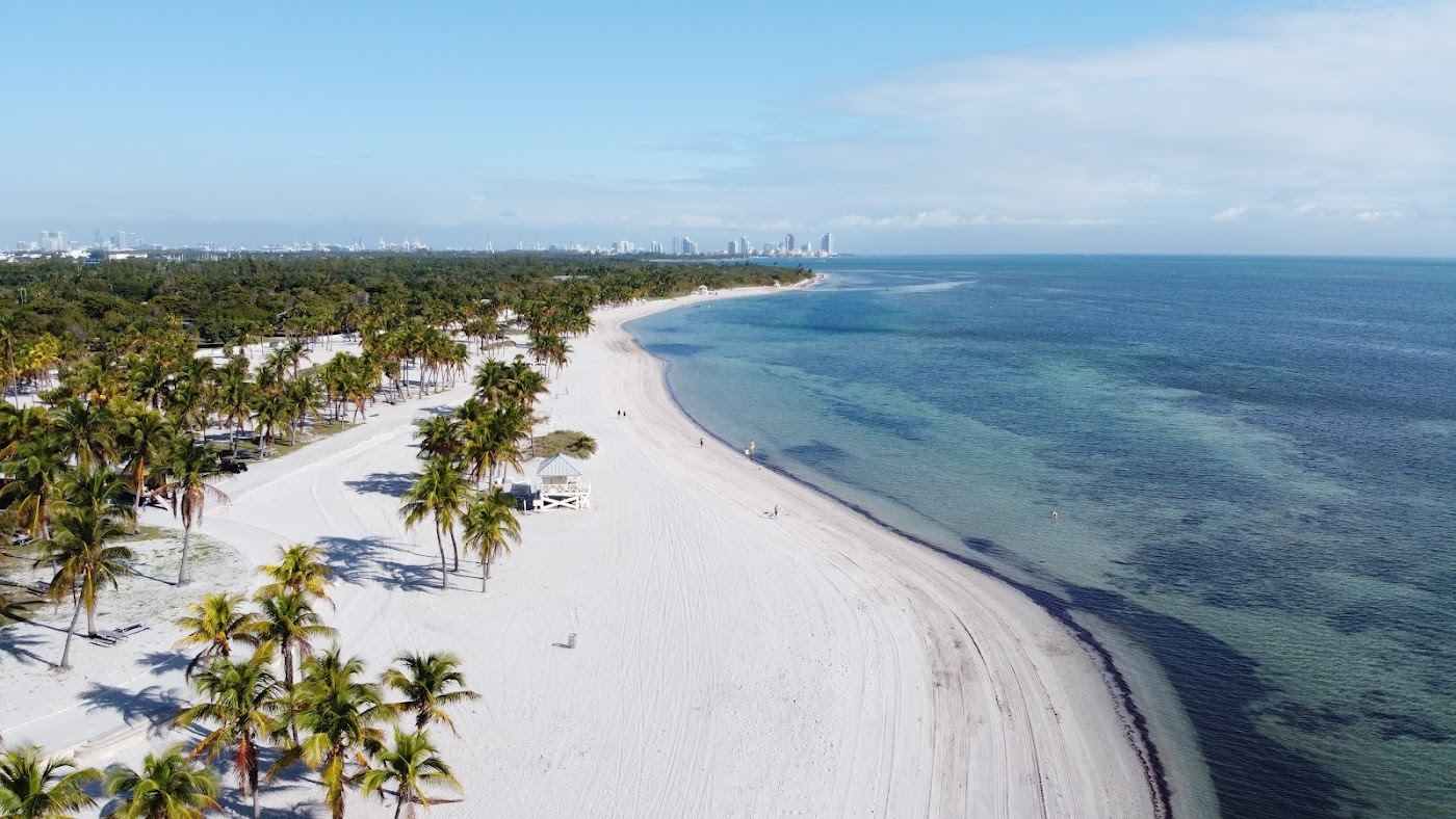 Shallow calm water and wide pale sand at Crandon Park on Key Biscayne near Miami