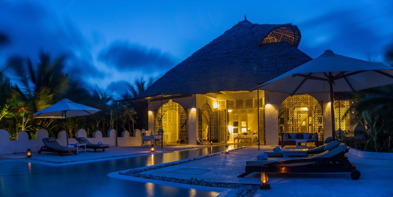 The wide white sand and palms of Msambweni Beach on Kenya's south coast
