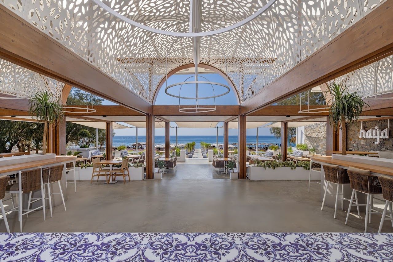 Sea beds and gazebos on the sand at Naya beach club on the east coast of Rhodes