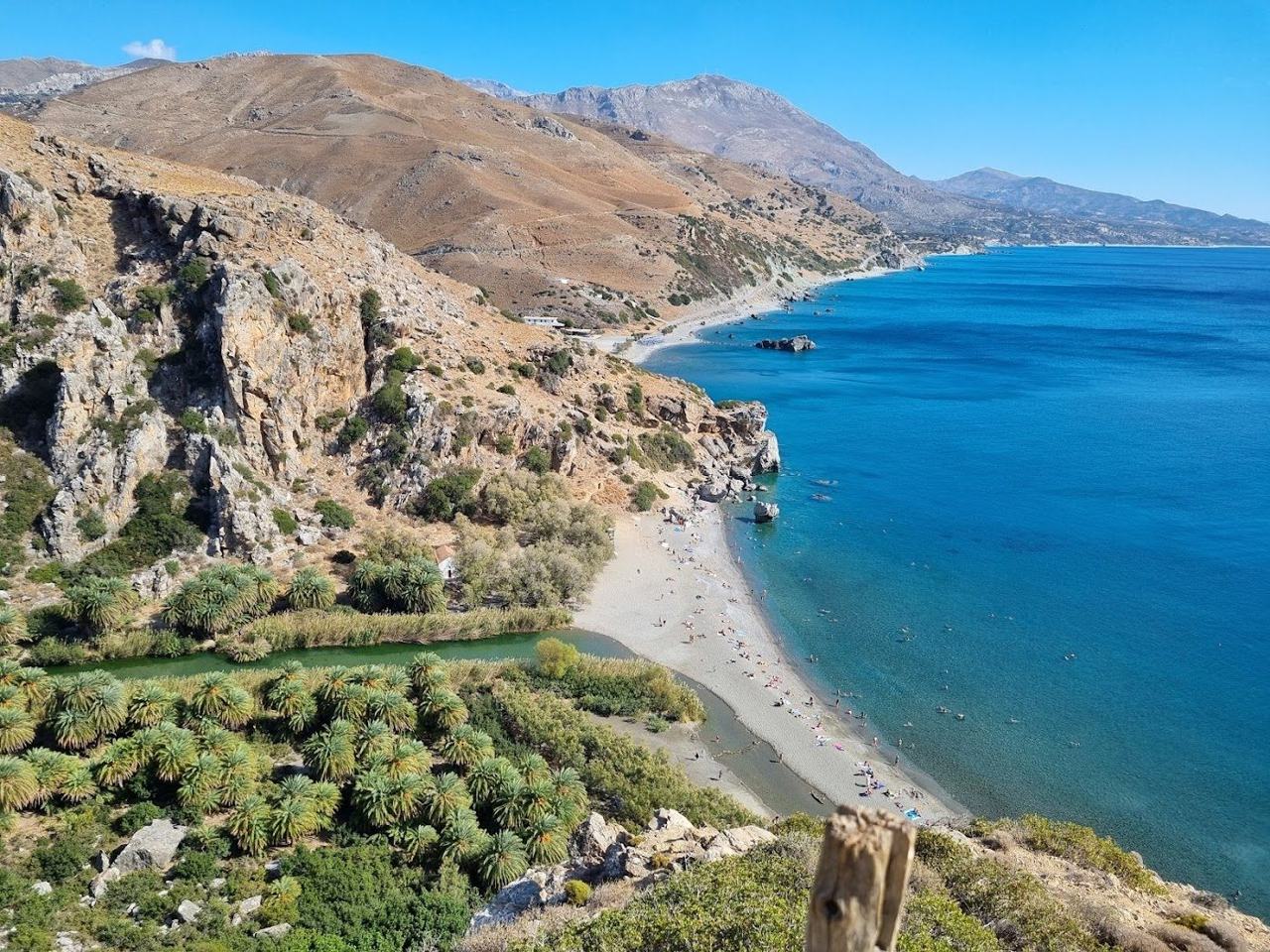 A palm fringed river beach on the wild south coast of Crete, far from the busy north