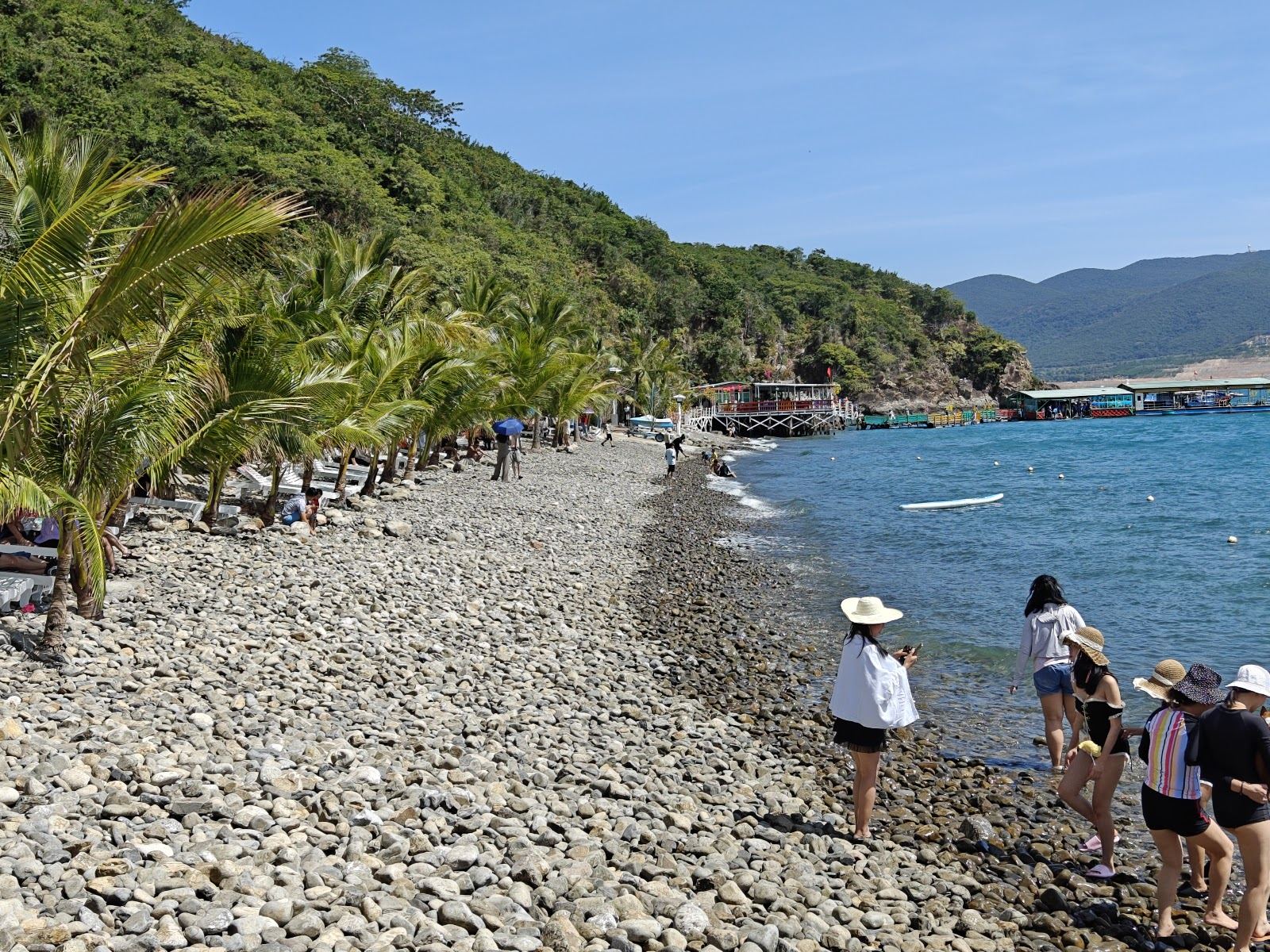 The long curve of Nha Trang City Beach and its seafront promenade along Tran Phu Boulevard in Vietnam