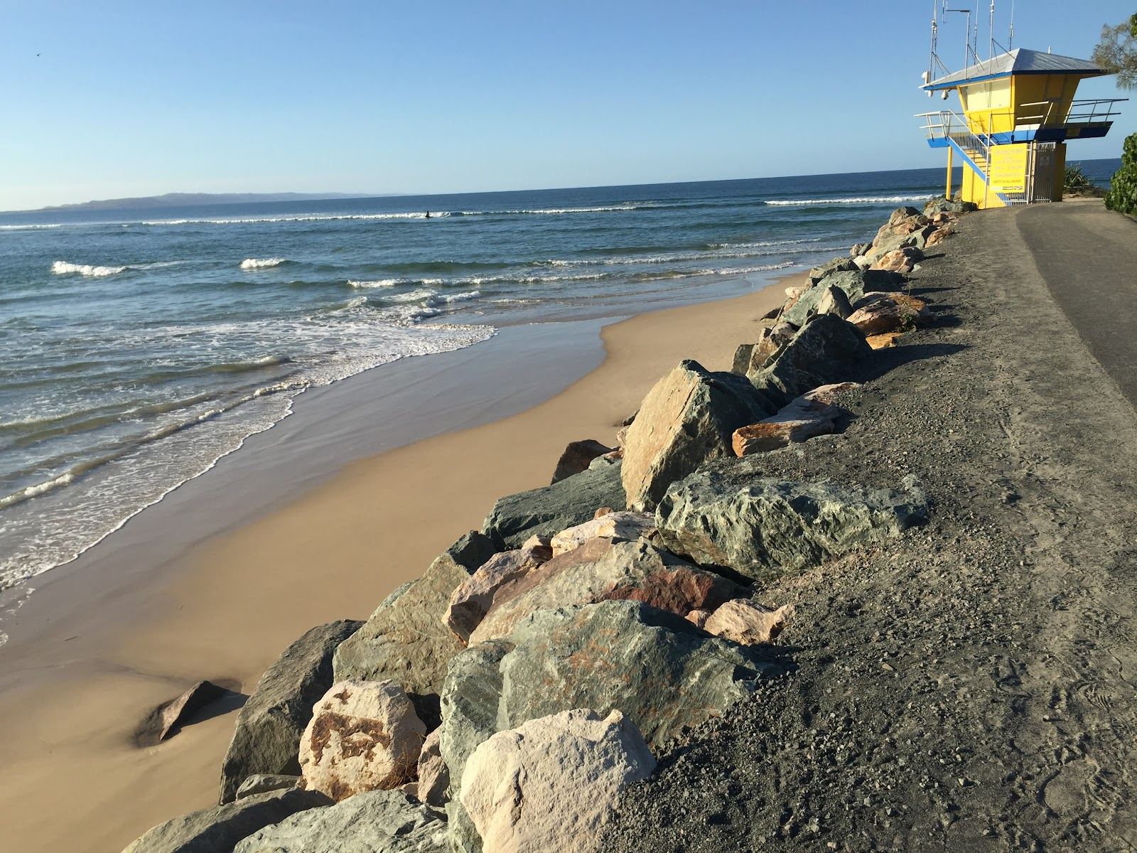 Soft evening light over a Noosa beach