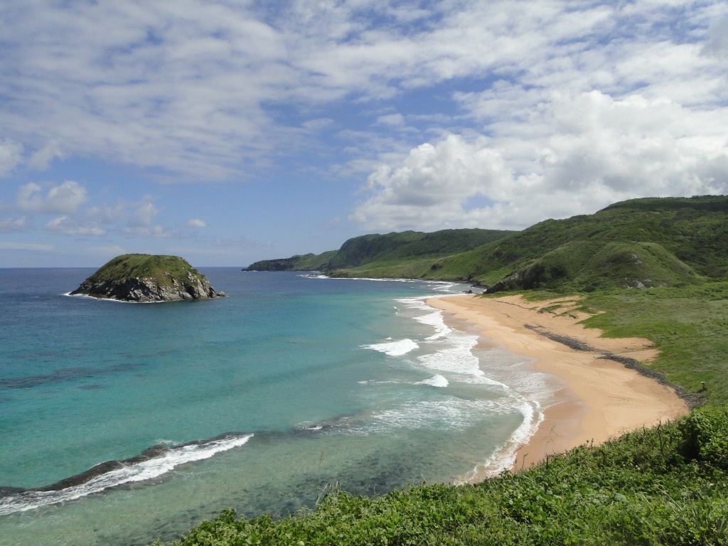 Empty wild sand at a secluded Fernando de Noronha beach with no crowds