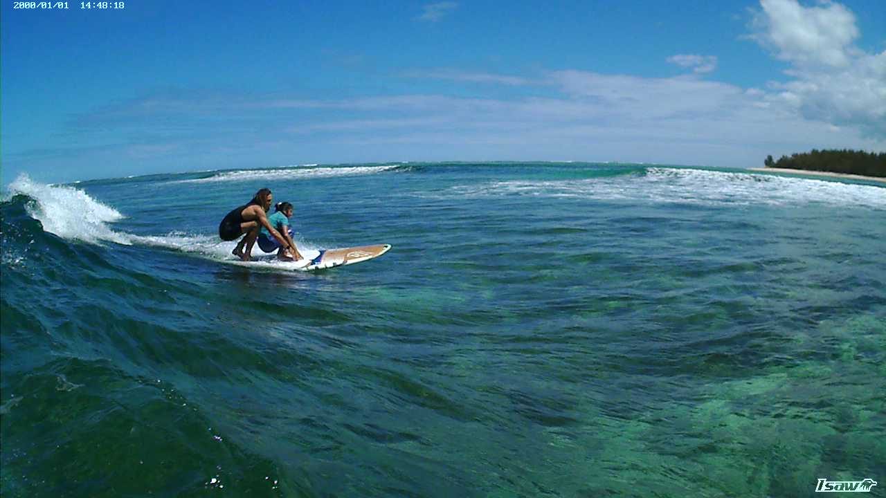 A calm reef sheltered lagoon below a dramatic mountain on the southwest of Mauritius