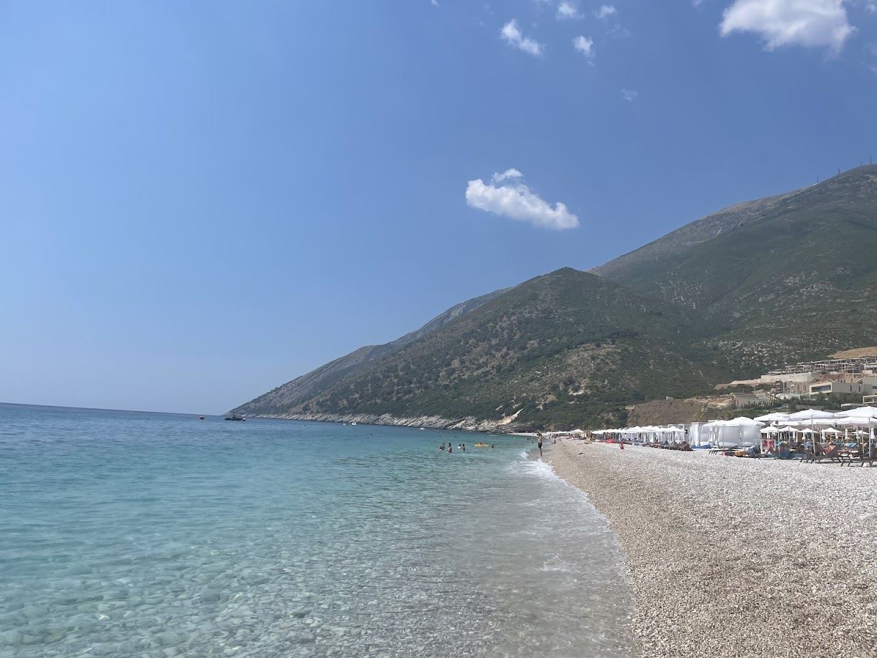 The pebble shore and mountain backdrop at Palase below the Llogara pass on the Albanian Riviera