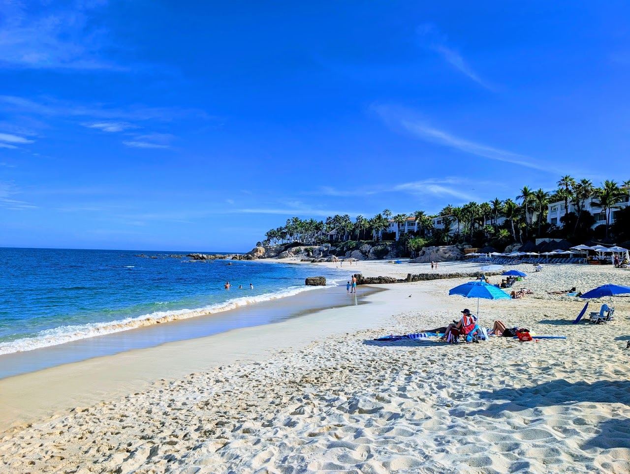 The sheltered curve of Palmilla Beach below the headland on the Los Cabos corridor