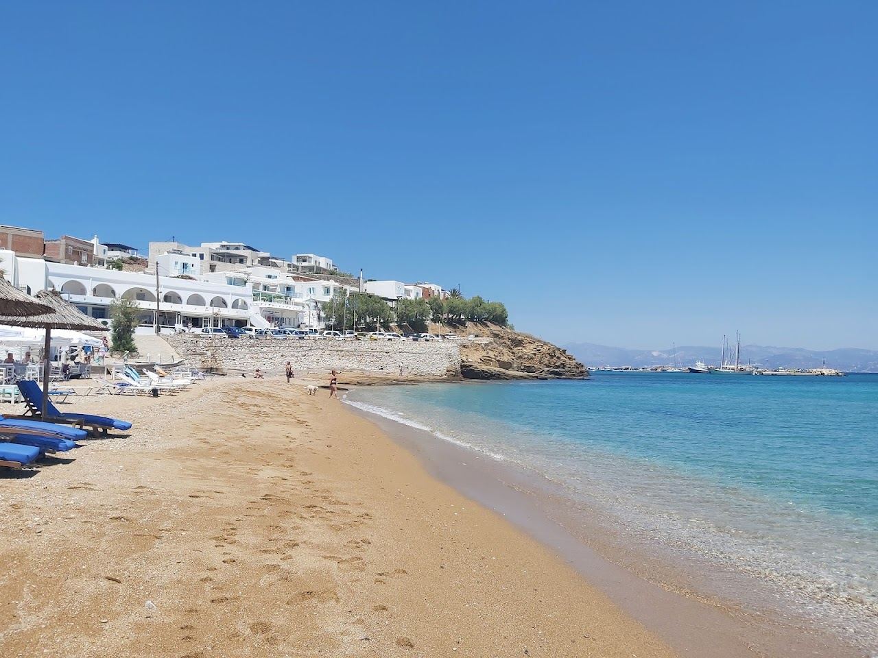 Soft sand and calm shallow water at Logaras beach on the sheltered east coast of Paros