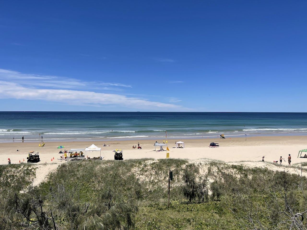 The open east facing sand and breaking surf of Peregian Beach in Queensland