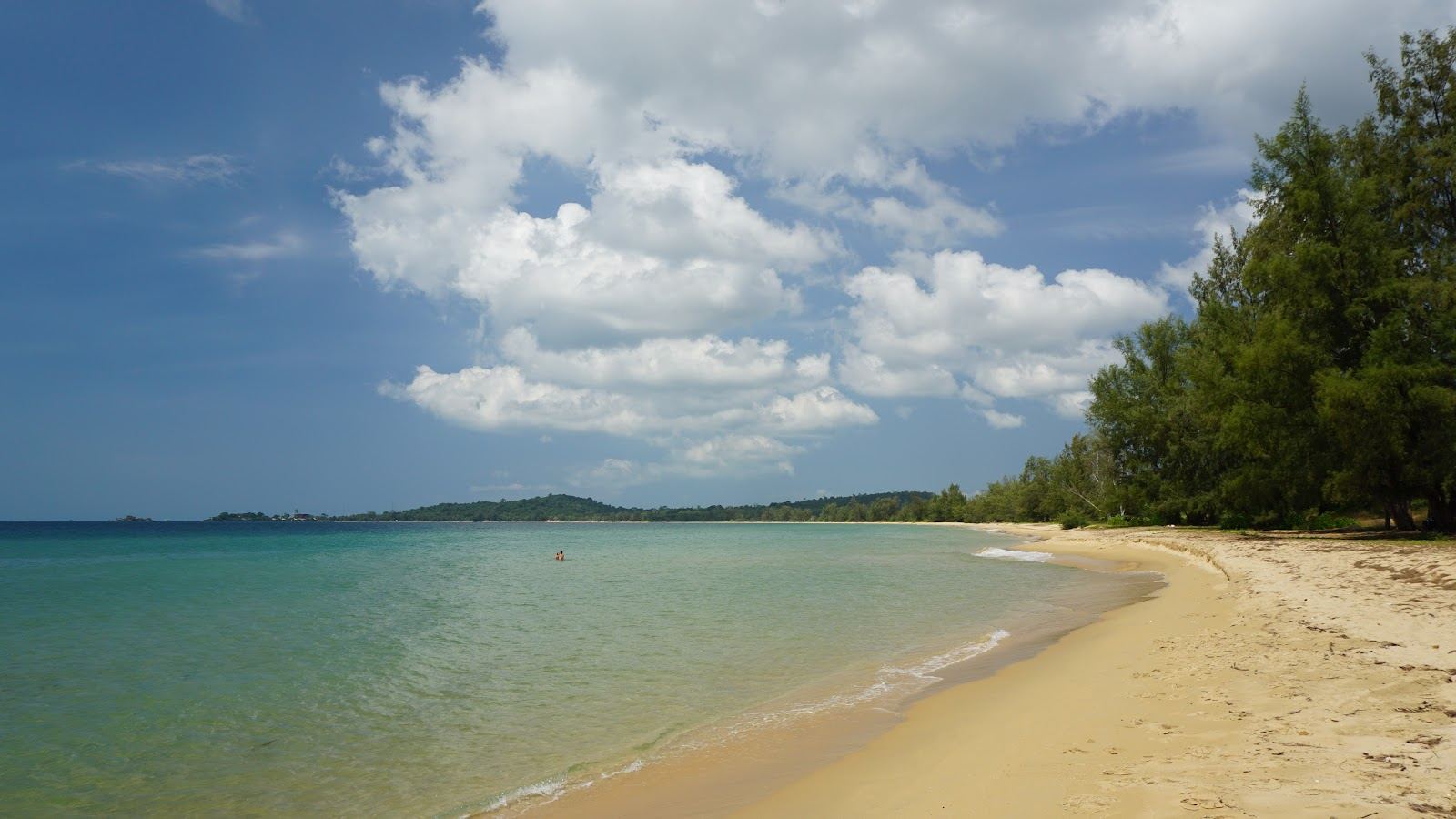 Empty forest backed sand and quiet water at a secluded beach on Phu Quoc
