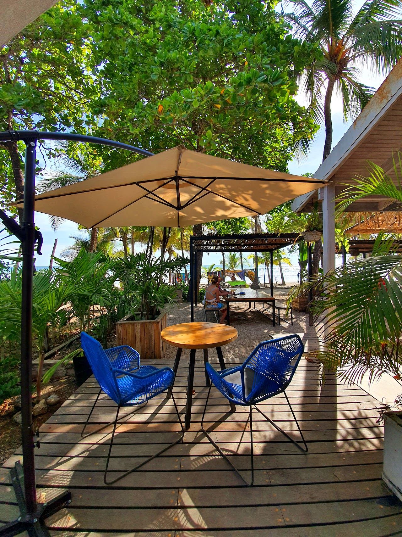 Sandy beach break and surfers at Playa Carmen in Santa Teresa Costa Rica