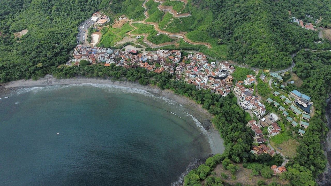 Calm gray sand cove at Playa Danta in Las Catalinas Guanacaste Costa Rica