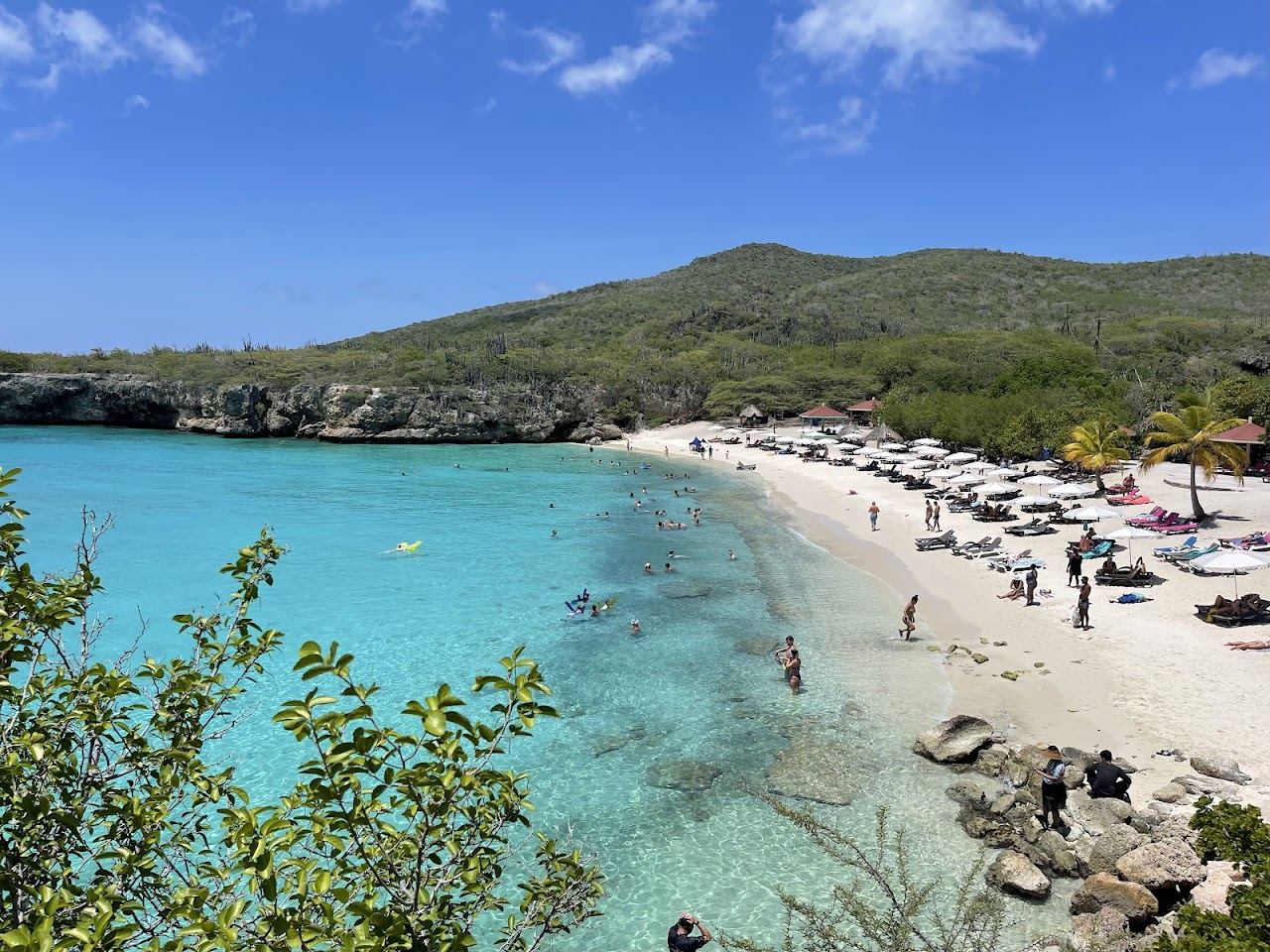 The white sand and clear turquoise water of the small Kleine Knip cove in Curacao