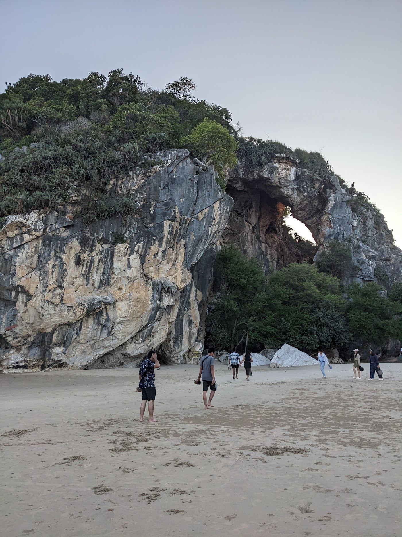 The quiet sand and calm Gulf water along Pranburi Beach at Pak Nam Pran