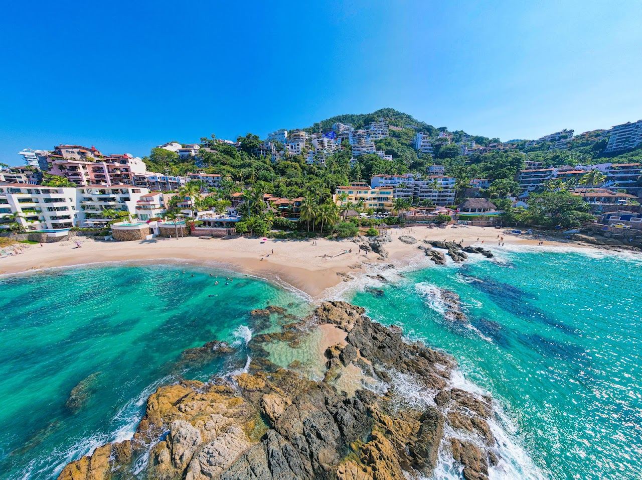 Rocky coves and clear Pacific water at Conchas Chinas on the south shore of Puerto Vallarta