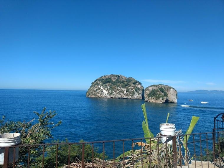 The calm water and palapa restaurants of Mismaloya cove near Puerto Vallarta