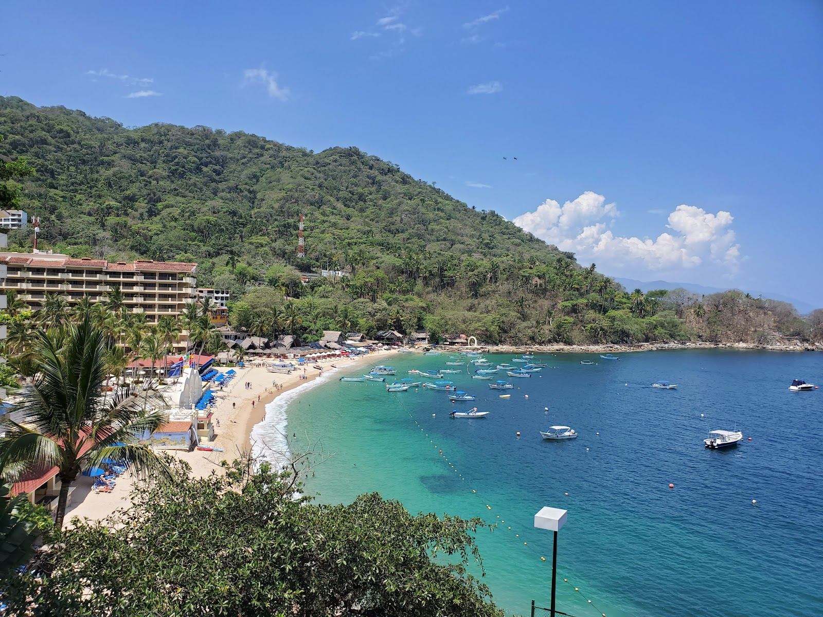 The sheltered cove and green headlands of Mismaloya Beach south of Puerto Vallarta