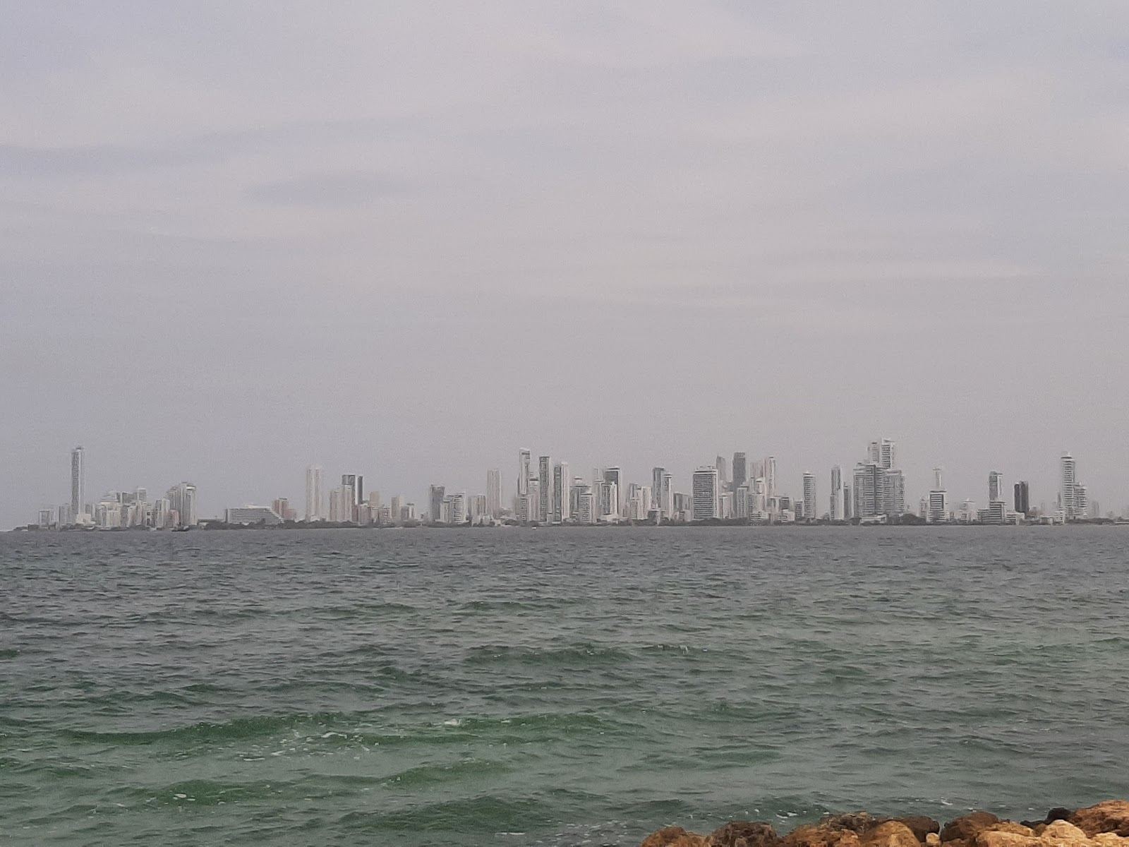 White sand beach and clear shallow water at Punta Arena on Tierra Bomba near Cartagena