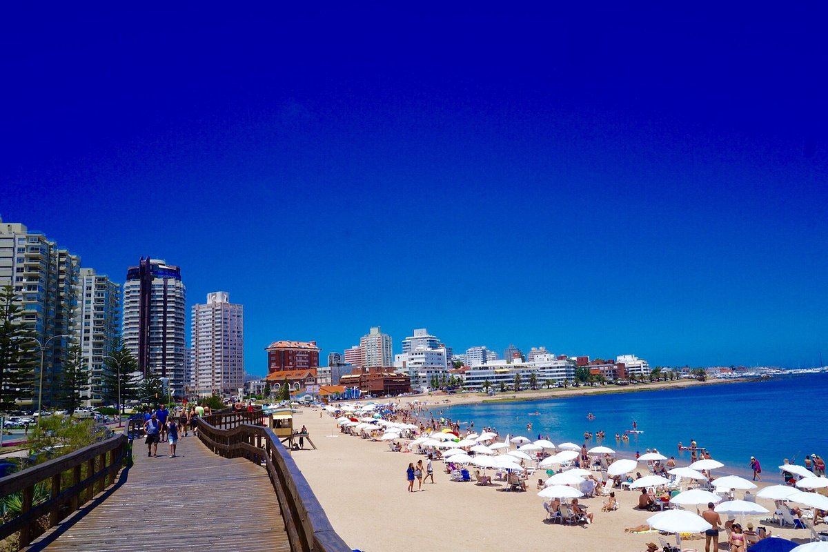 Wide free public sand and calm promenade water on the Mansa side of Punta del Este
