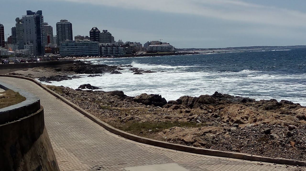 Rocky point and clear shallows on the Punta del Este peninsula in Uruguay