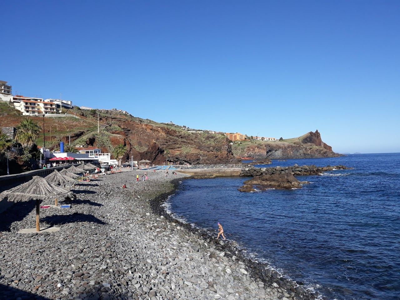 Pebble beach and small fishing slip at Reis Magos near Canico on the south coast of Madeira