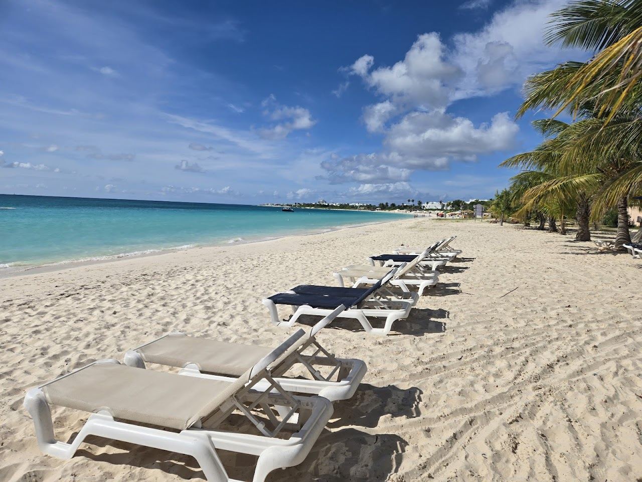 The long calm crescent of pale sand at Rendezvous Bay in Anguilla