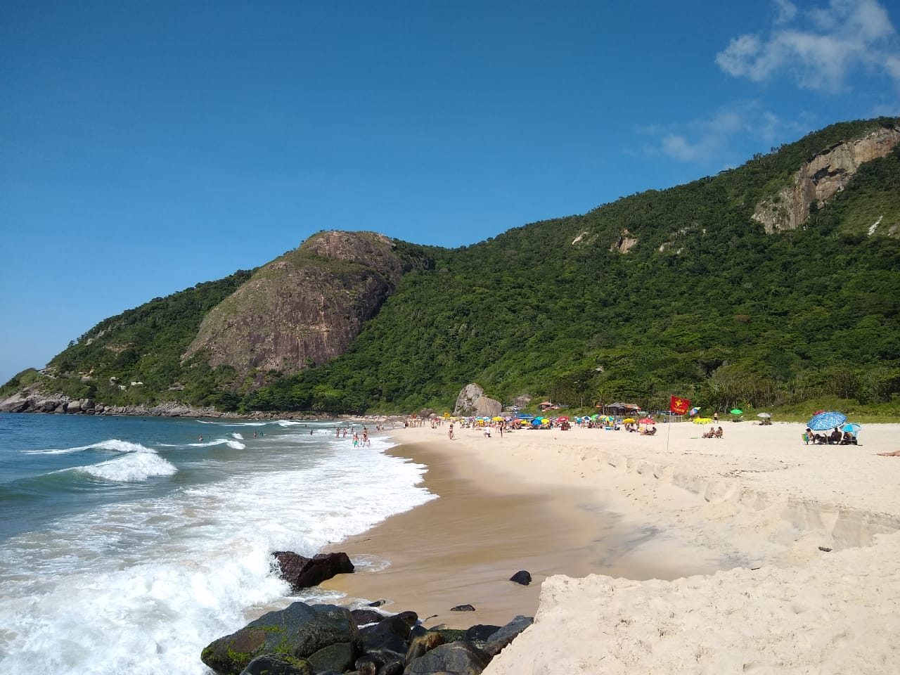 The wild green backed sand of Prainha beach west of the city in Rio de Janeiro Brazil