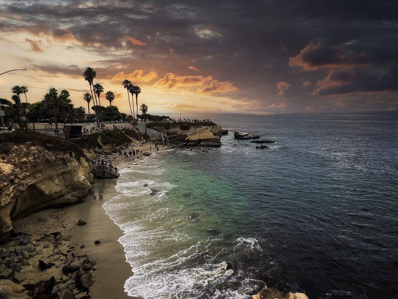 Clear cove water and rocky reef at La Jolla Cove in San Diego California