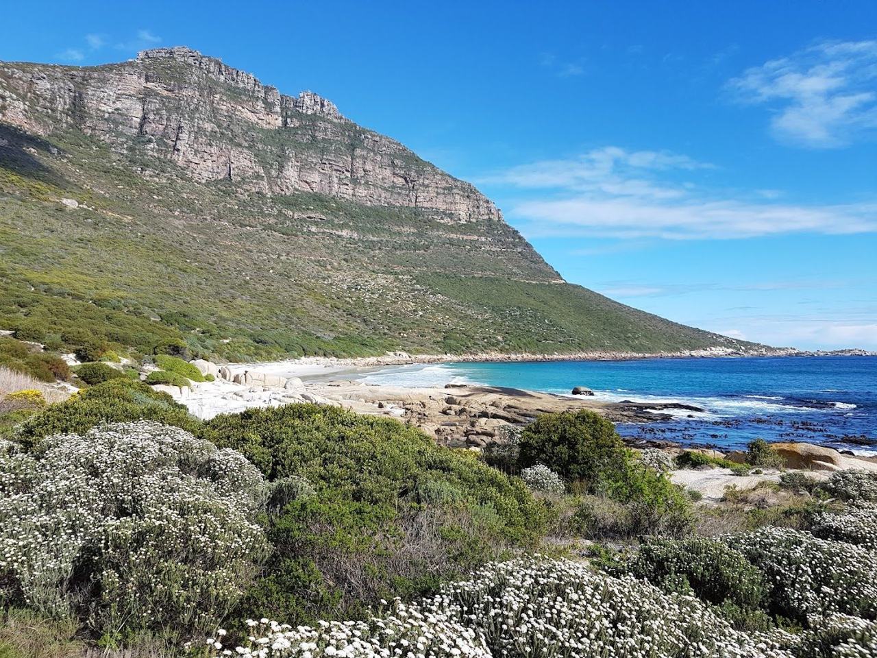 Sandy Bay secluded white sand and boulders below Llandudno in Cape Town