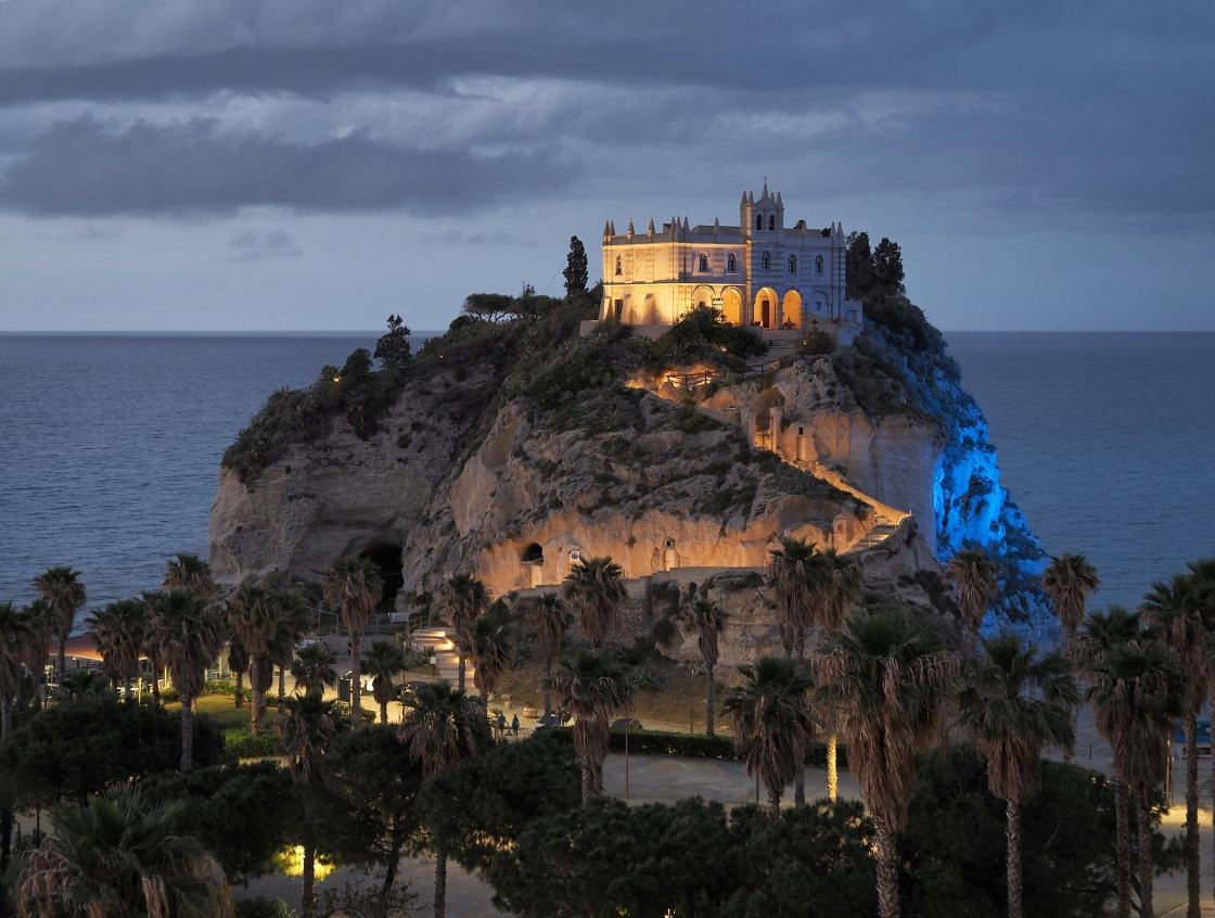 The sanctuary of Santa Maria dell'Isola on its rock above the Tropea shoreline, near the Convento sand
